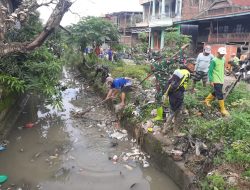 KORAMIL 05/DUA PITUE MENGAJAK WARGANYA BUDAYAKAN GOTONG ROYONG